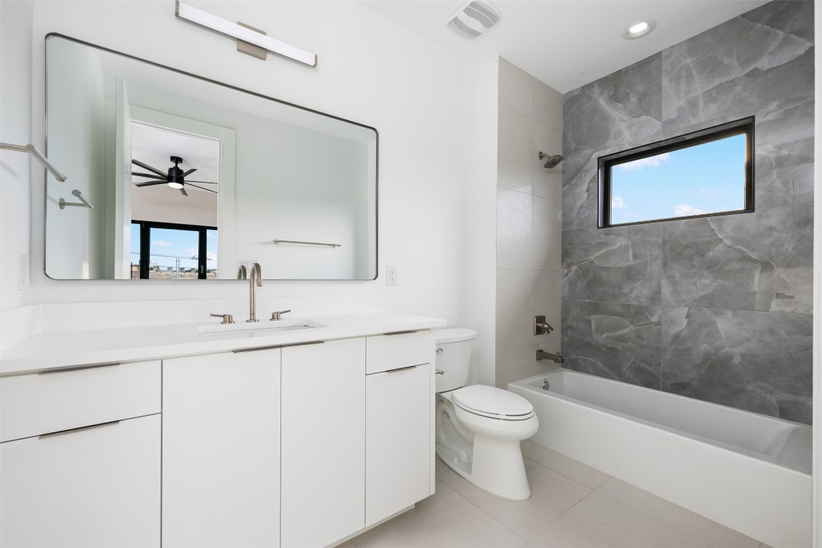 13701 A Montview Drive Austin, TX 78732 - Photo 18 of 40 Secondary bathroom with Italian tile.