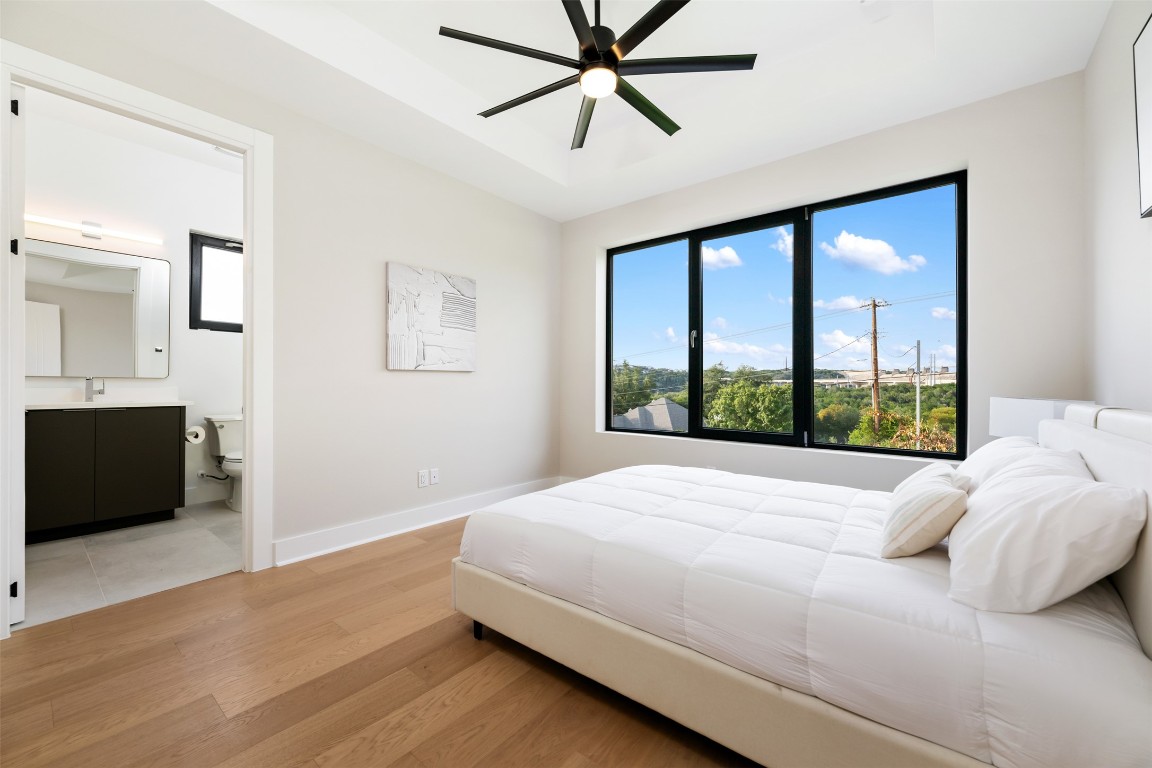 13701 A Montview Drive Austin, TX 78732 - Photo 21 of 40 Bedroom with views and private bathroom.