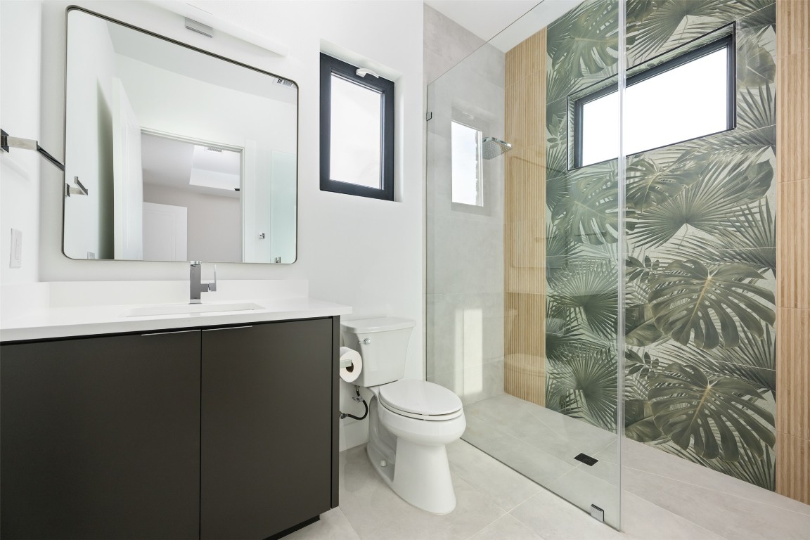 13701 A Montview Drive Austin, TX 78732 - Photo 22 of 40 Italian tile shower in this ensuite bathroom.