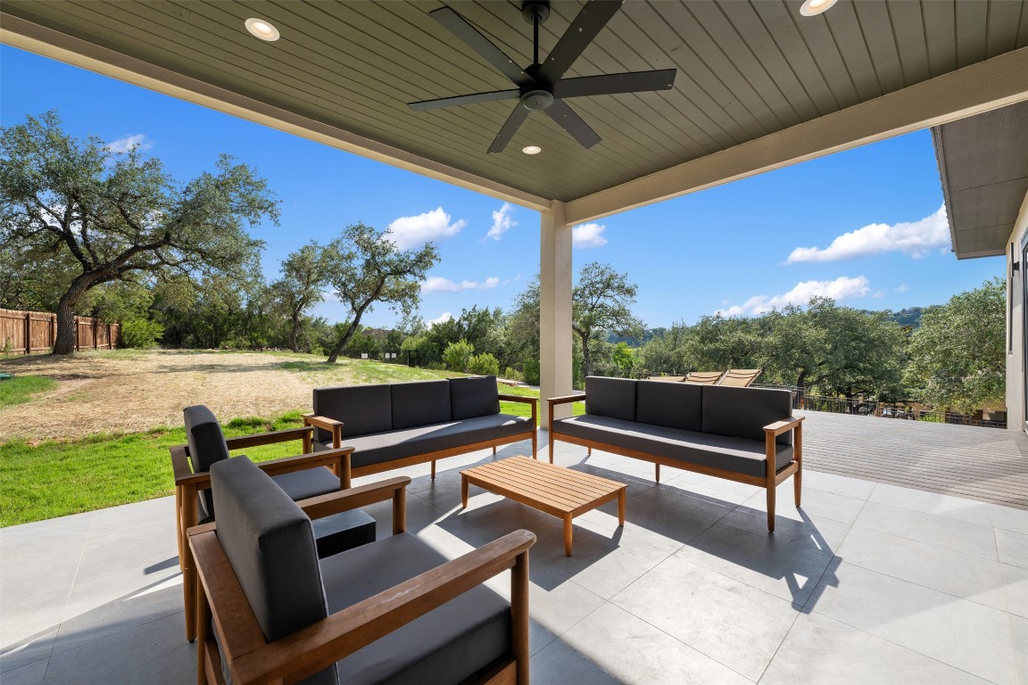 13701 A Montview Drive Austin, TX 78732 - Photo 24 of 40 Covered patio off of family room with built-in grill, sink and cabinetry.