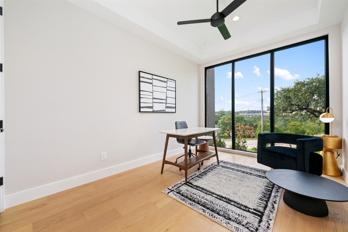 13701 A Montview Drive Austin, TX 78732 - Photo 8 of 40 Enjoy the view while working in this spacious study with closet and wall to ceiling windows .
