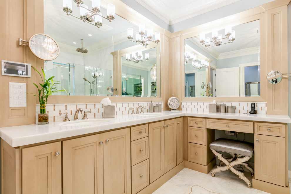 1230 North Ocean Boulevard Gulf Stream, FL 33483 - Photo 22 of 53 a bathroom with a sink vanity and mirror