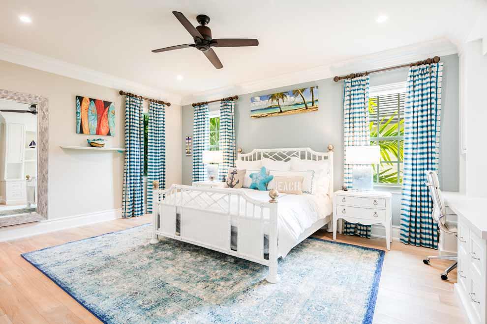 1230 North Ocean Boulevard Gulf Stream, FL 33483 - Photo 24 of 53 a bedroom with a bed and a window