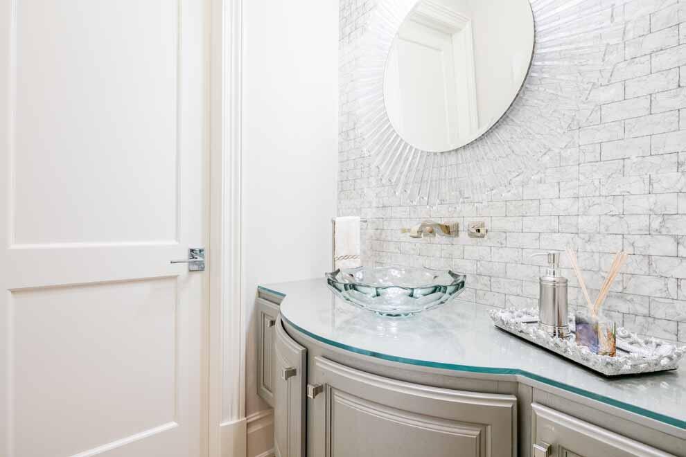 1230 North Ocean Boulevard Gulf Stream, FL 33483 - Photo 27 of 53 a bathroom with a sink and a mirror