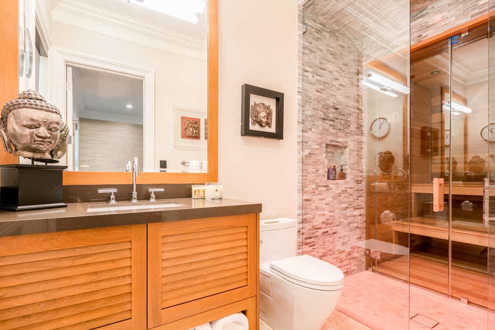 1230 North Ocean Boulevard Gulf Stream, FL 33483 - Photo 31 of 53 a bathroom with a sink a toilet and shower