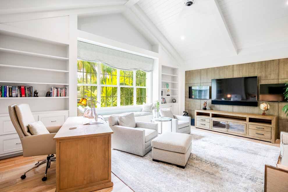 1230 North Ocean Boulevard Gulf Stream, FL 33483 - Photo 33 of 53 a living room with furniture and a flat screen tv