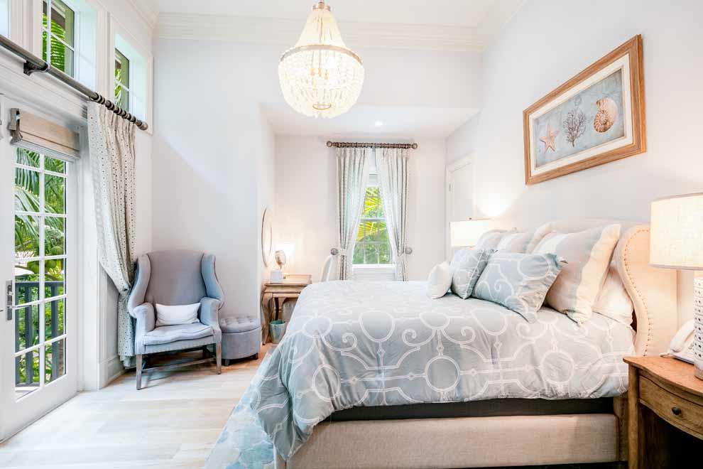 1230 North Ocean Boulevard Gulf Stream, FL 33483 - Photo 34 of 53 a bedroom with a bed and window