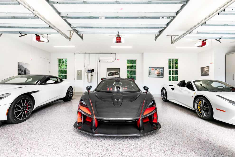 1230 North Ocean Boulevard Gulf Stream, FL 33483 - Photo 36 of 53 a car is parked in a garage