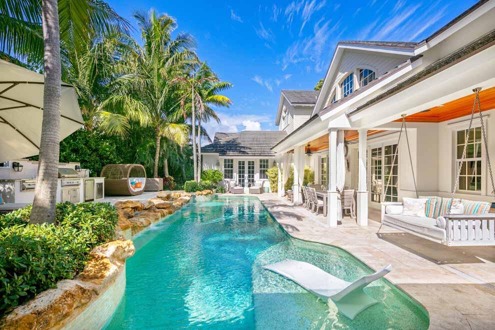 1230 North Ocean Boulevard Gulf Stream, FL 33483 - Photo 37 of 53 a view of a house with backyard porch and sitting area