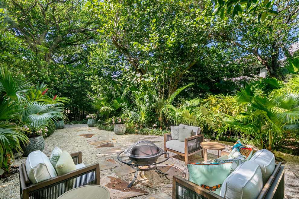 1230 North Ocean Boulevard Gulf Stream, FL 33483 - Photo 42 of 53 a outdoor living space with furniture and garden view