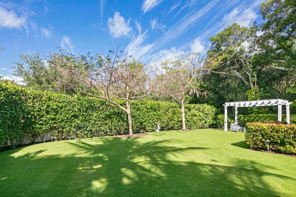 1230 North Ocean Boulevard Gulf Stream, FL 33483 - Photo 44 of 53 a view of a backyard with garden