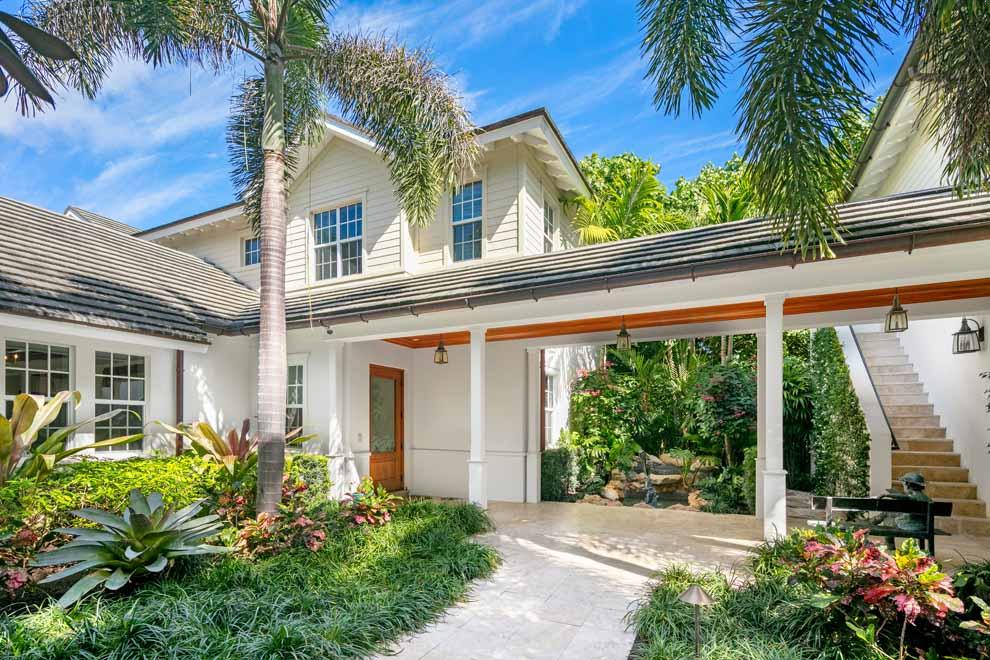 1230 North Ocean Boulevard Gulf Stream, FL 33483 - Photo 6 of 53 front view of a house with a garden