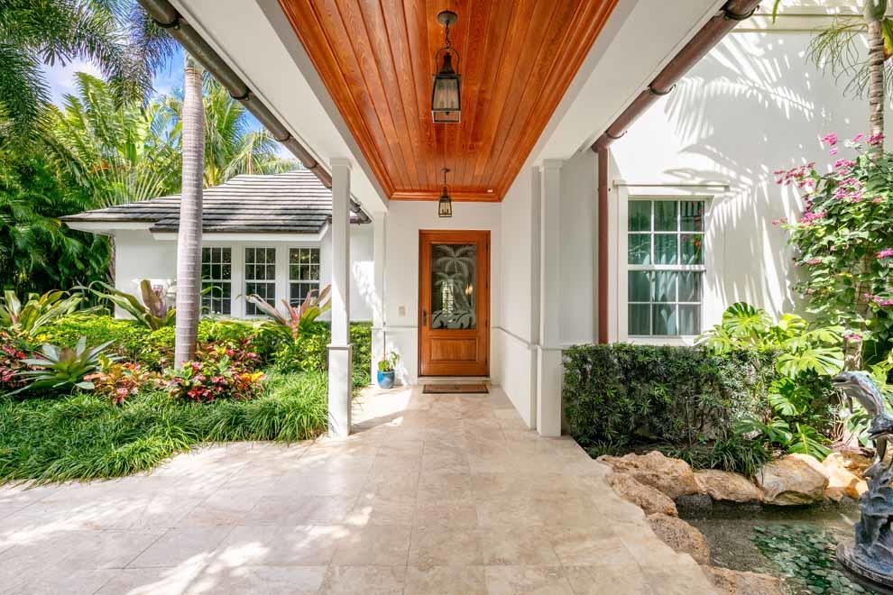1230 North Ocean Boulevard Gulf Stream, FL 33483 - Photo 7 of 53 a view of a house with backyard and garden