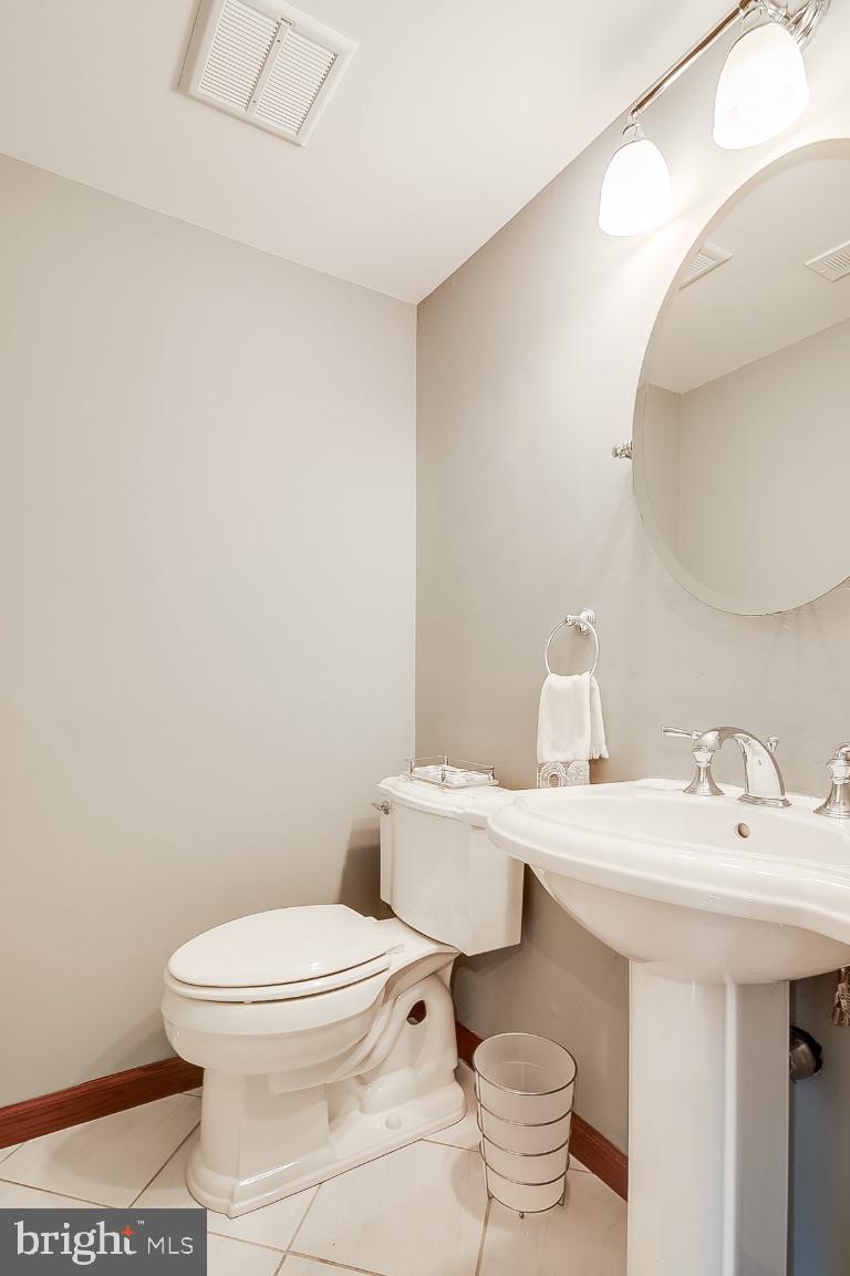 229 Manvell Road Southeast Vienna, VA 22180 - Photo 15 of 40 Downstairs half bath
