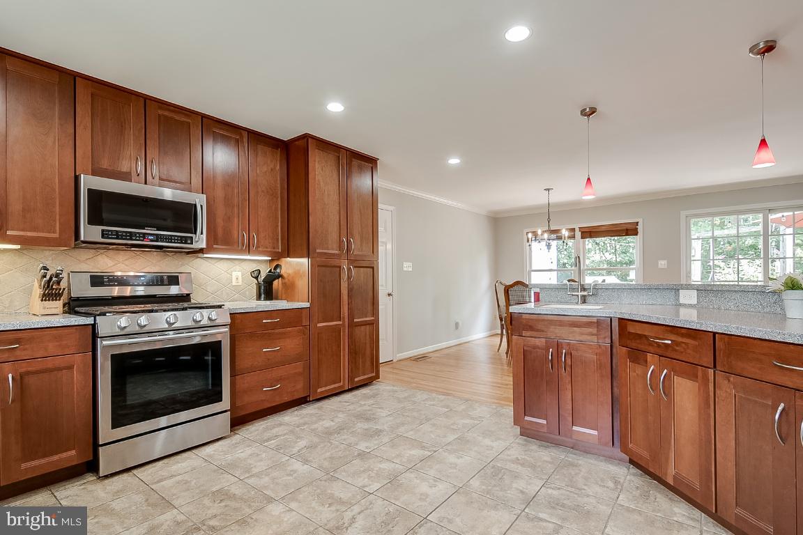 229 Manvell Road Southeast Vienna, VA 22180 - Photo 6 of 40 Tiled open kitchen!