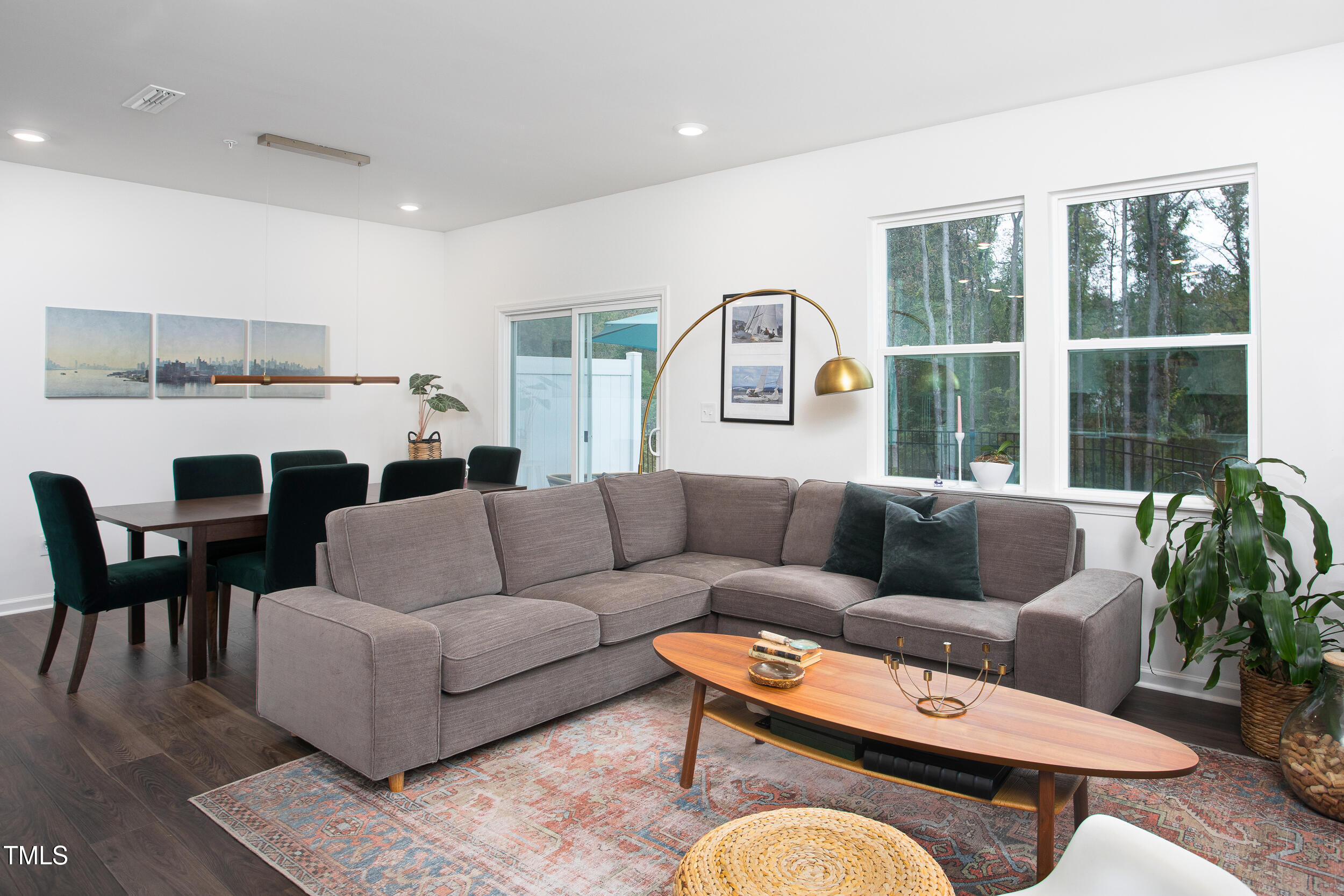 128 Rialto Street Chapel Hill, NC 27516 - Photo 15 of 44 a living room with furniture kitchen view and a large window