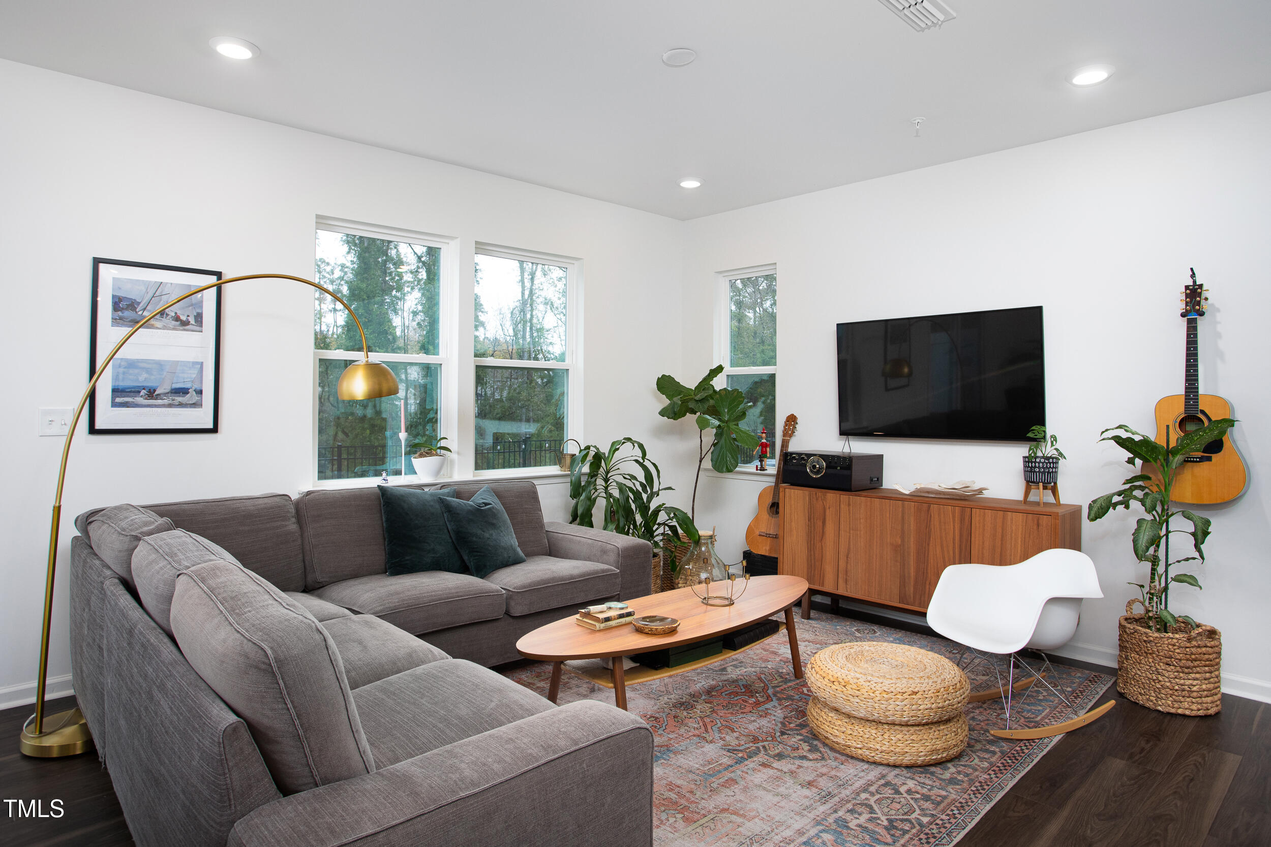 128 Rialto Street Chapel Hill, NC 27516 - Photo 19 of 44 a living room with furniture and a flat screen tv