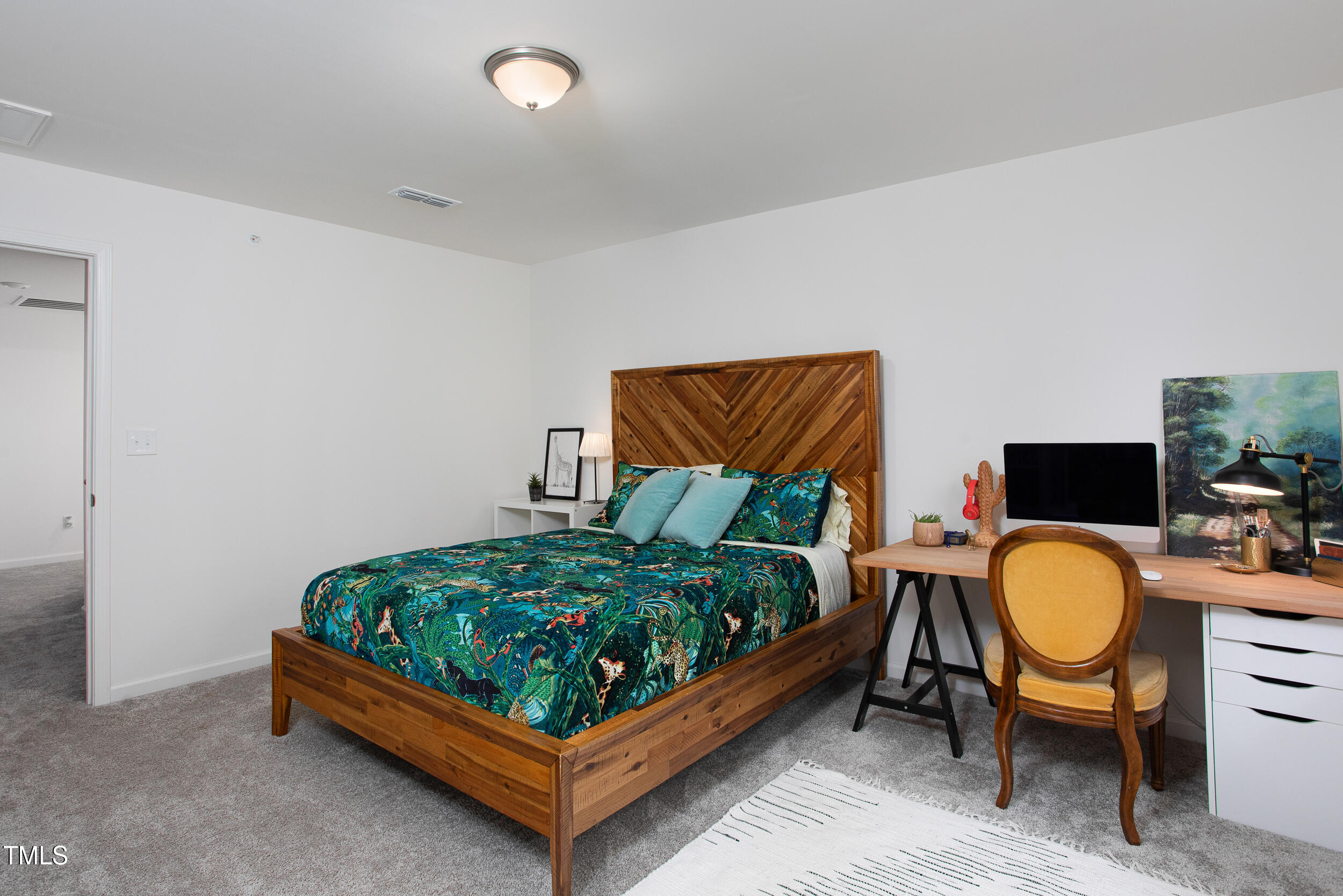 128 Rialto Street Chapel Hill, NC 27516 - Photo 28 of 44 a bed room with a bed chair and a couch