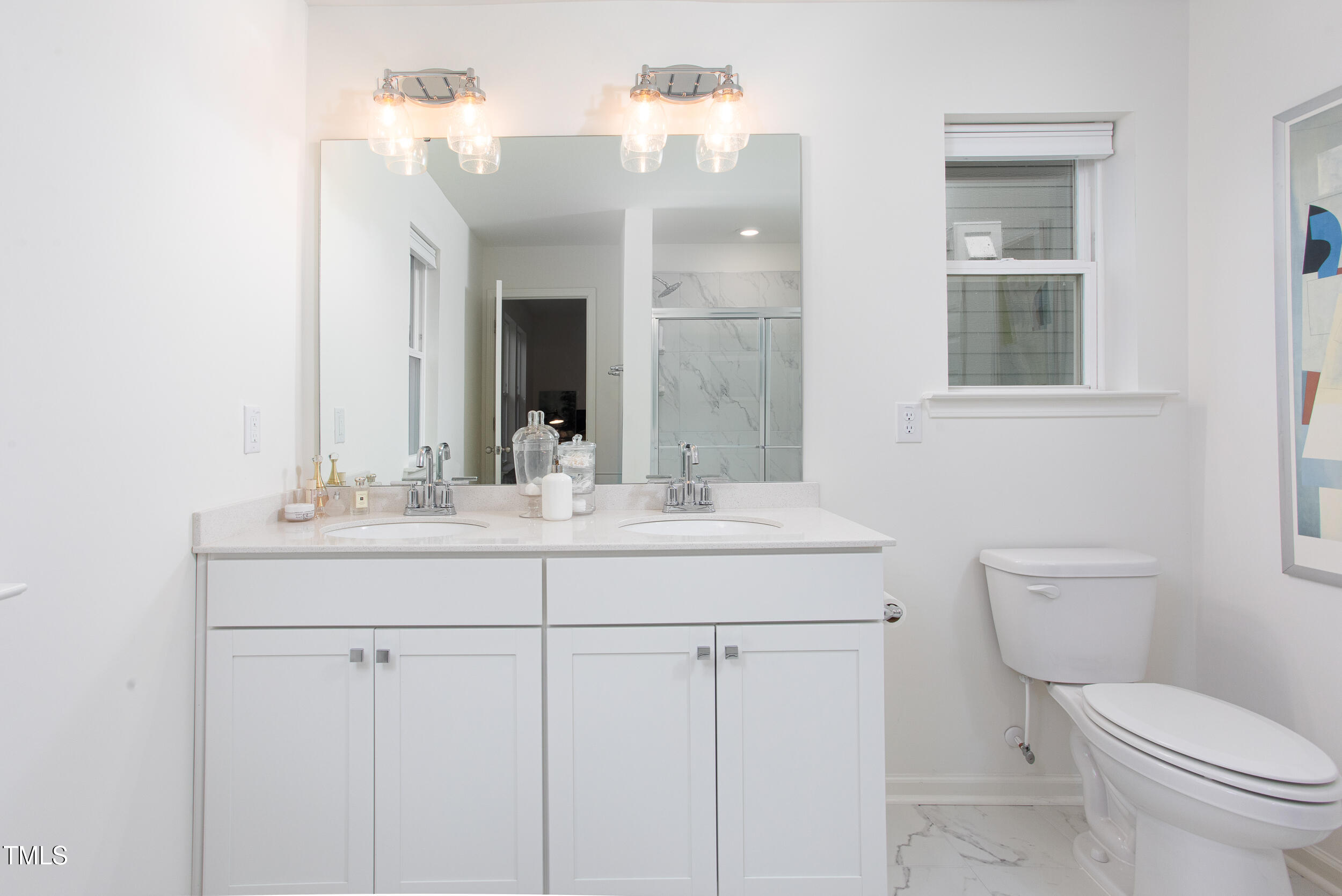 128 Rialto Street Chapel Hill, NC 27516 - Photo 29 of 44 a bathroom with a toilet a sink and mirror