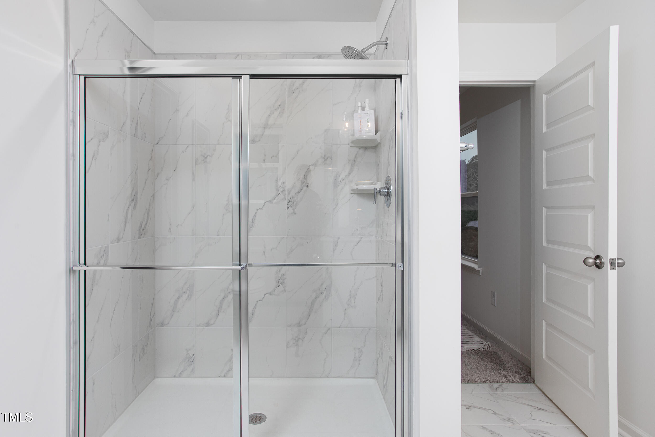 128 Rialto Street Chapel Hill, NC 27516 - Photo 30 of 44 a bathroom with a glass shower door