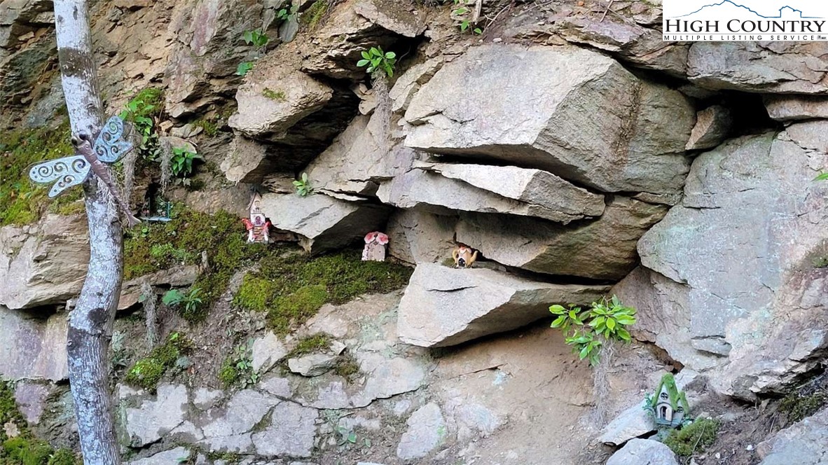 1157 Pine Ridge Road Beech Mountain, NC 28604 - Photo 20 of 25 an aerial view of a house with a patio and wooden floor