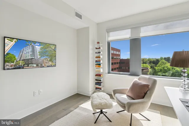 a view of a livingroom with furniture and a couch