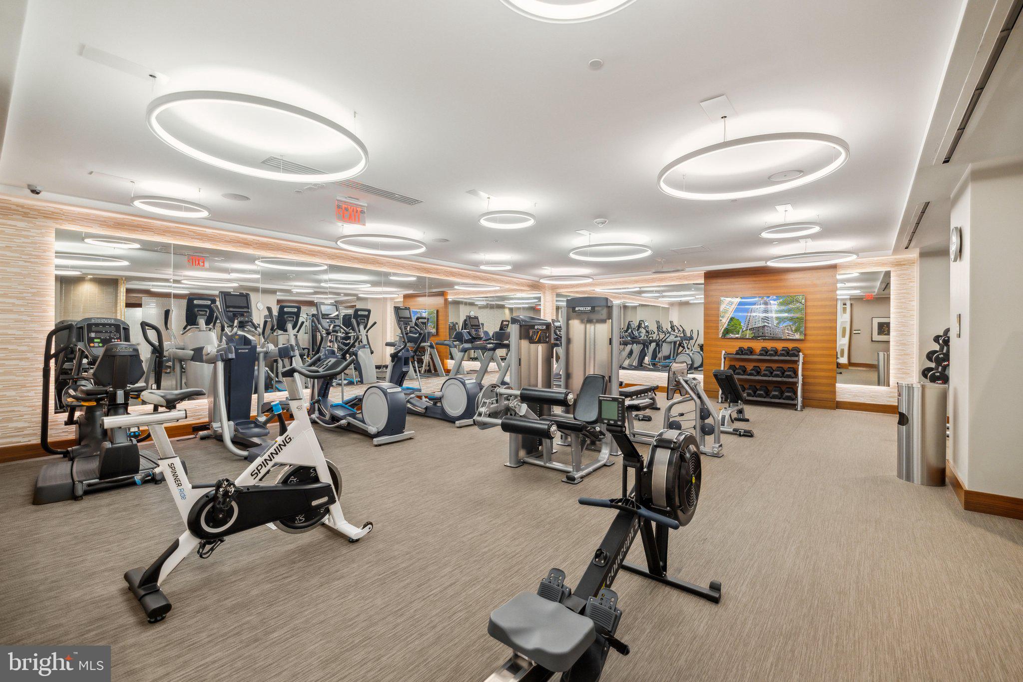 4960 Fairmont Avenue, Unit 706 Bethesda, MD 20814 - Photo 20 of 26 a view of a room with gym equipment