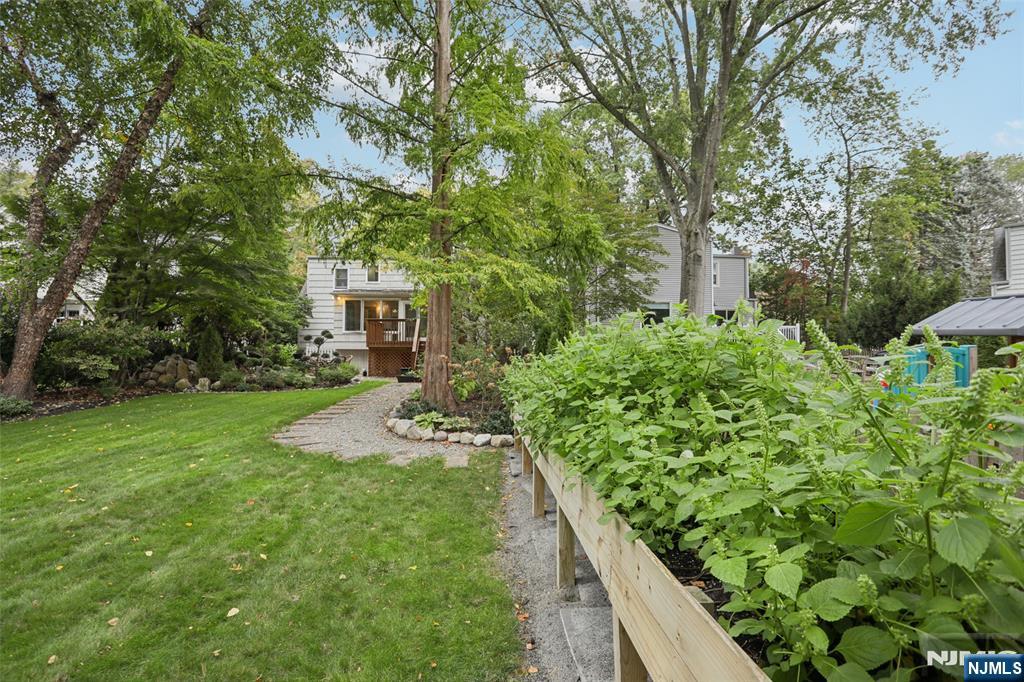 322 Marshall Street Ridgewood, NJ 07450 - Photo 26 of 32 a view of house with patio outdoor seating
