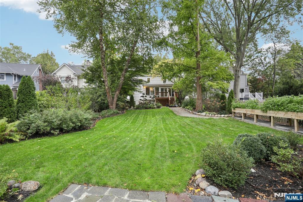 322 Marshall Street Ridgewood, NJ 07450 - Photo 29 of 32 a view of house with garden space and trees