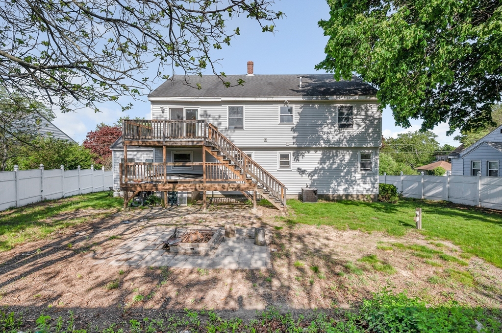 7 Marie Street Methuen, MA 01844 - Photo 35 of 39 a view of a house with a yard and plants
