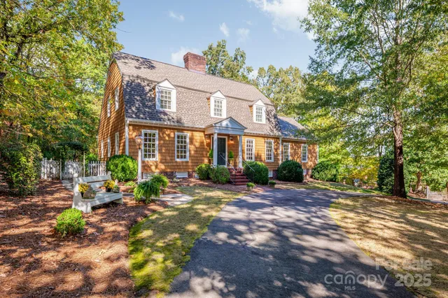 a view of a brick building next to a road