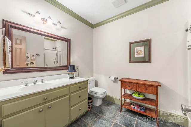 a utility room with dryer washer and a window