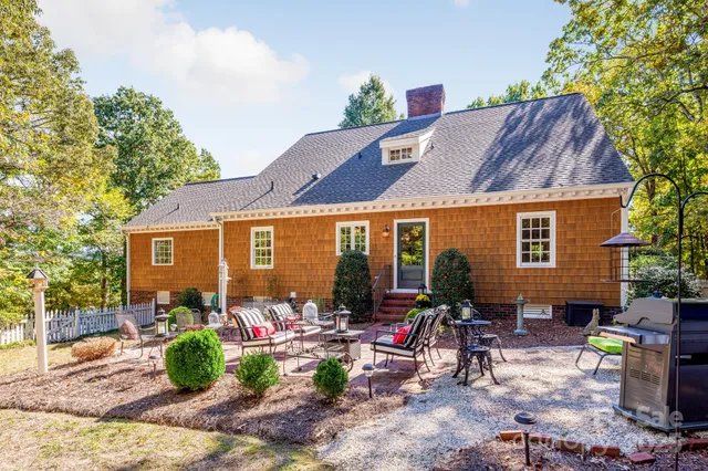 a view of yard with patio