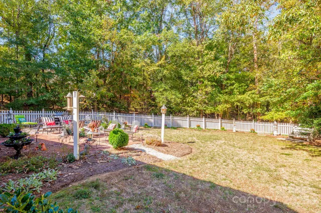 a view of a bench in a backyard
