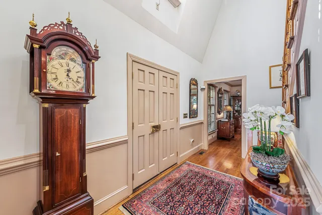 a area with lots of furniture and wooden floor