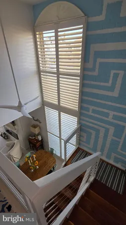 a workspace with furniture and window