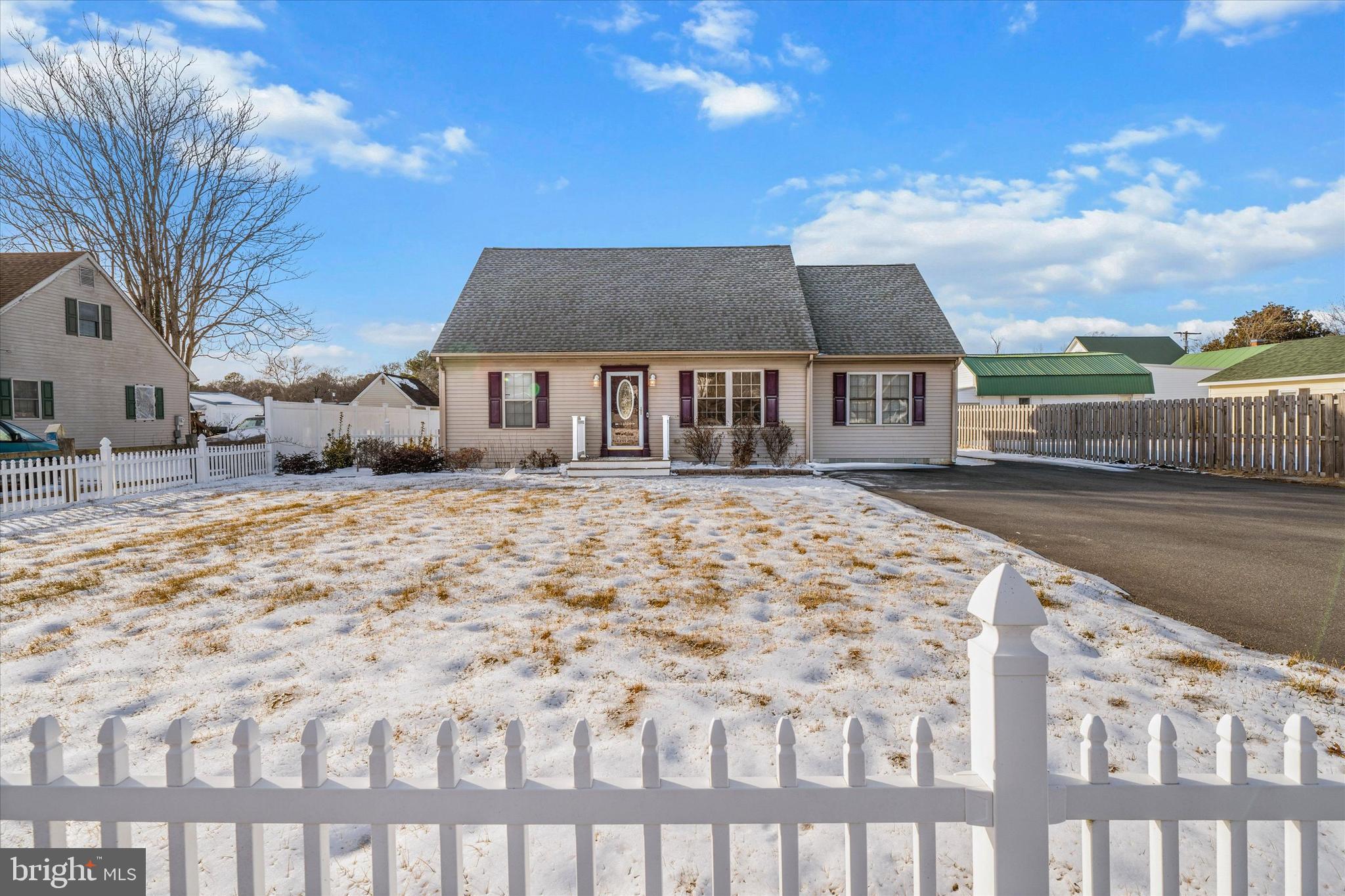 31536 White Street Laurel, DE 19956 - Photo 2 of 62 a front view of a house with a yard