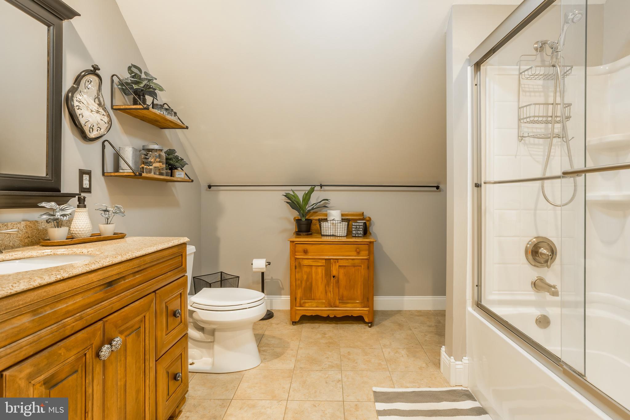 31536 White Street Laurel, DE 19956 - Photo 35 of 62 a bathroom with a sink a toilet and shower