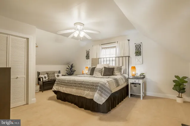 a view of a patio with a table and chairs
