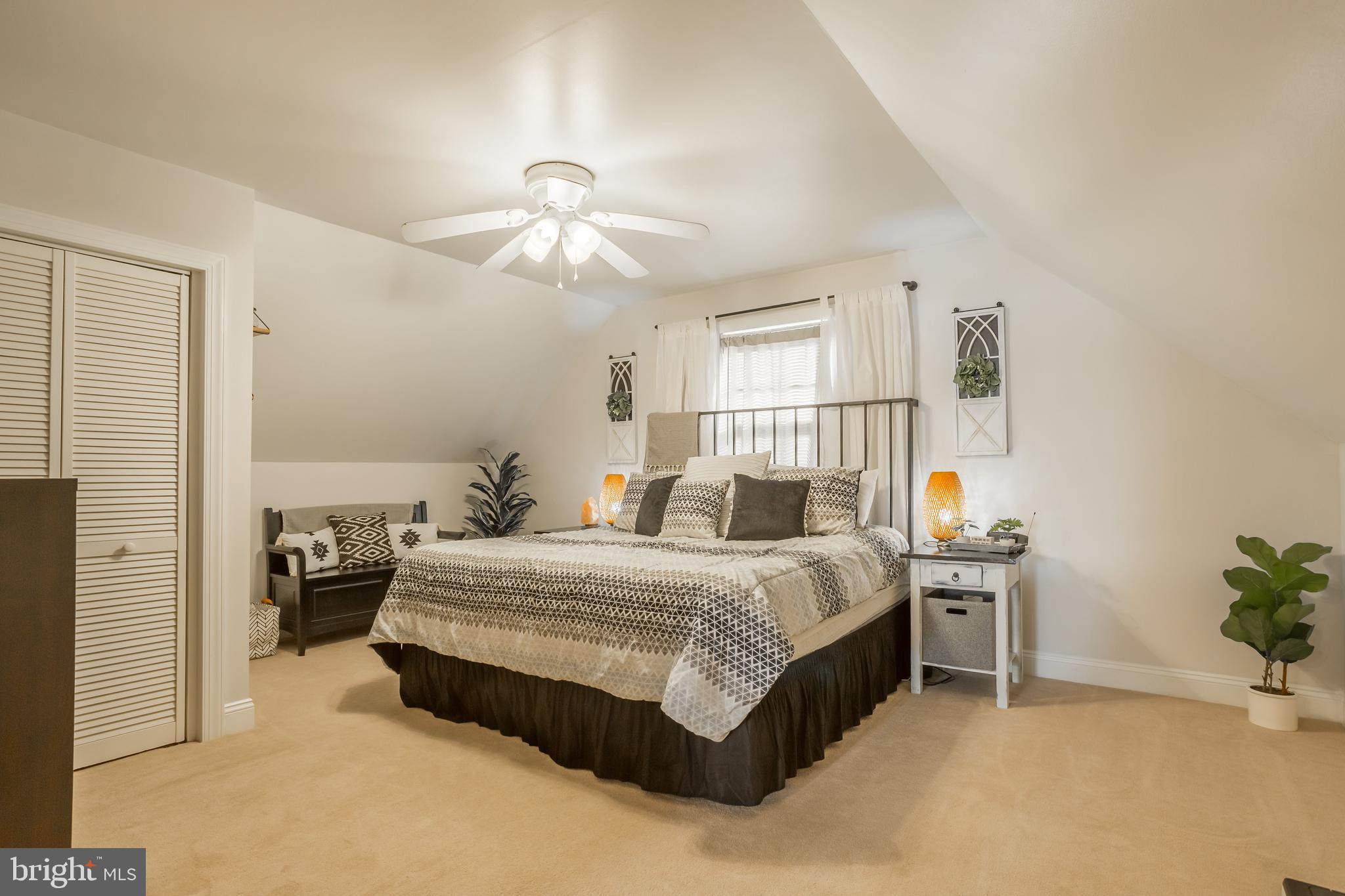31536 White Street Laurel, DE 19956 - Photo 45 of 62 a bedroom with a bed and ceiling fan