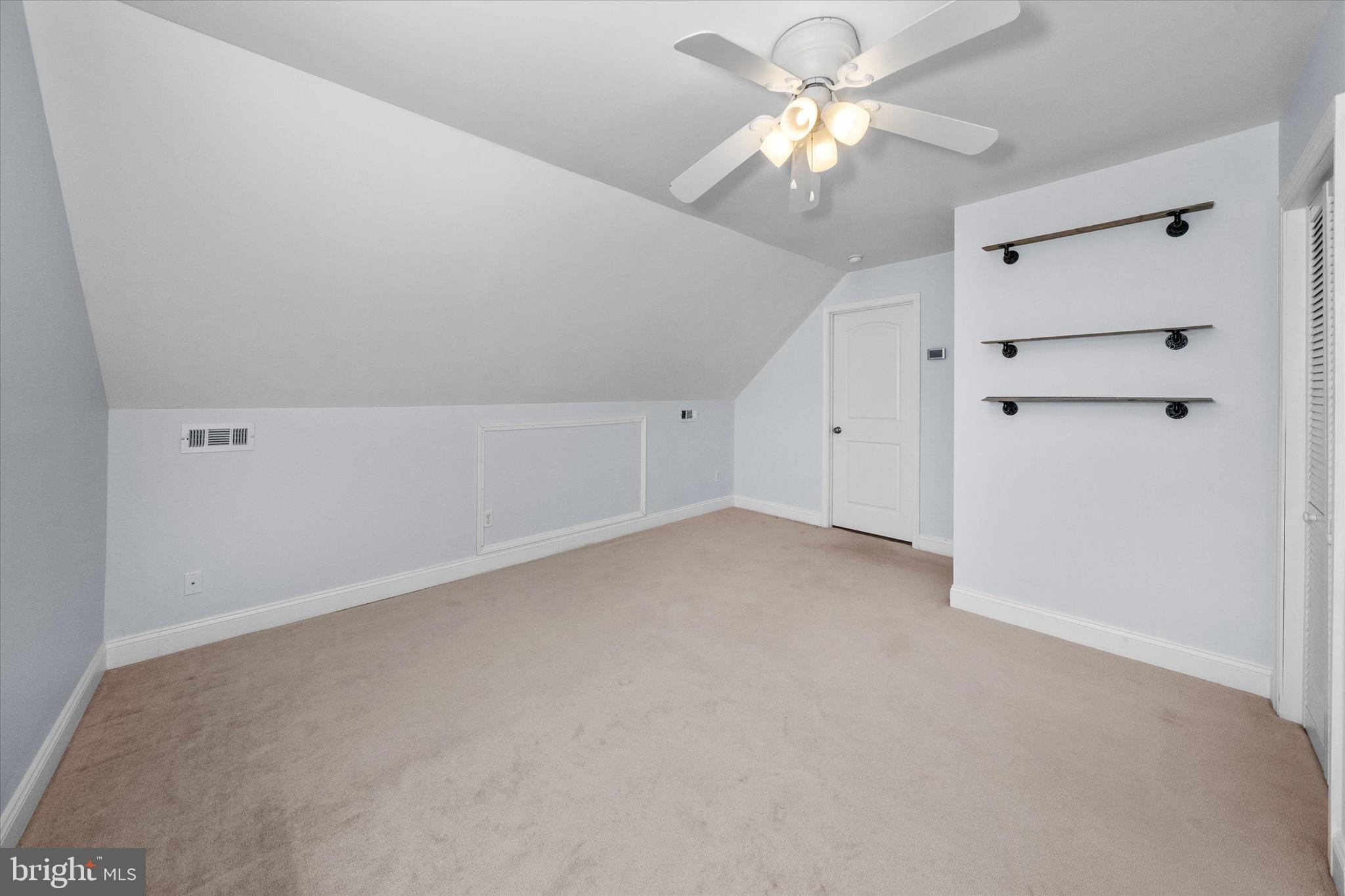 31536 White Street Laurel, DE 19956 - Photo 48 of 62 a view of a chandelier fan and closet in a room