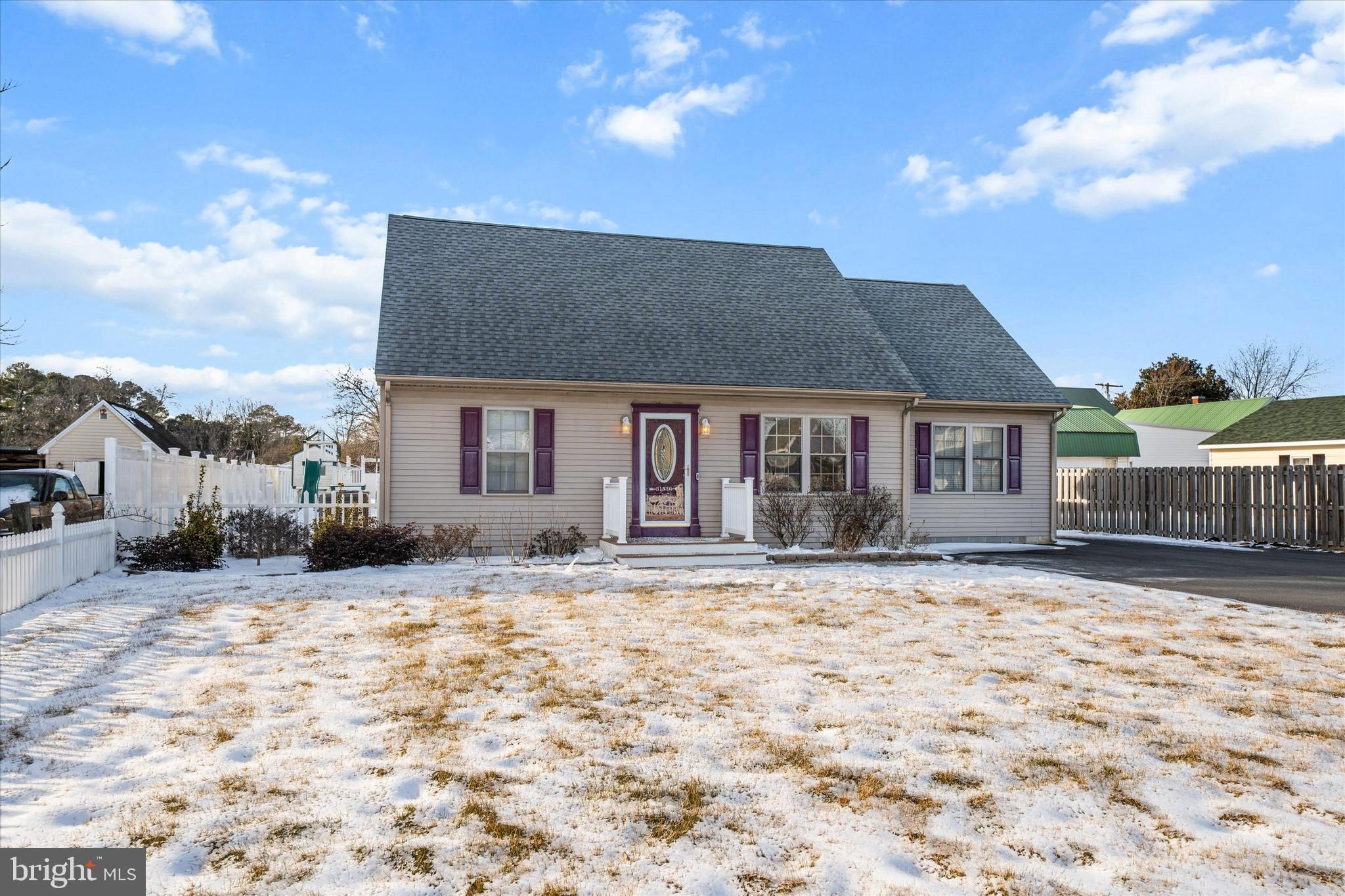 31536 White Street Laurel, DE 19956 - Photo 5 of 62 a front view of a house with a yard