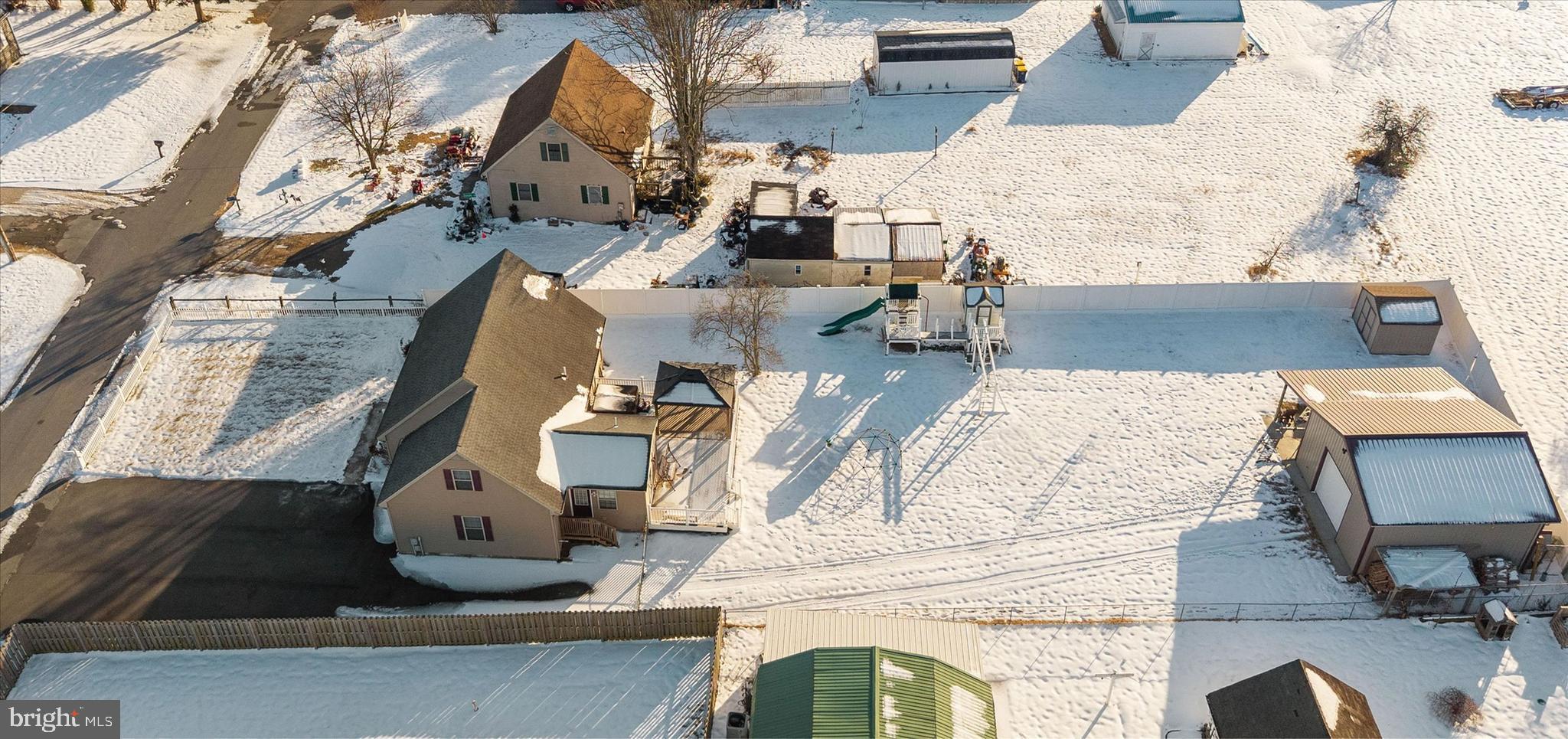 31536 White Street Laurel, DE 19956 - Photo 59 of 62 an aerial view of residential houses with outdoor space