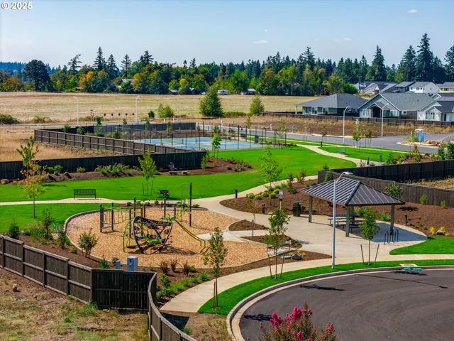 a view of an outdoor space and tennis court