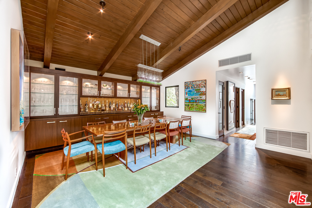 1787 Old Ranch Road Los Angeles, CA 90049 - Photo 21 of 54 a living room with patio furniture and wooden floor