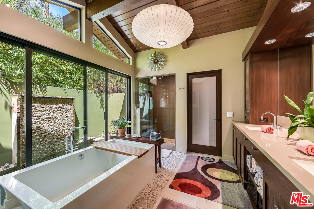 1787 Old Ranch Road Los Angeles, CA 90049 - Photo 31 of 54 a room with furniture and window