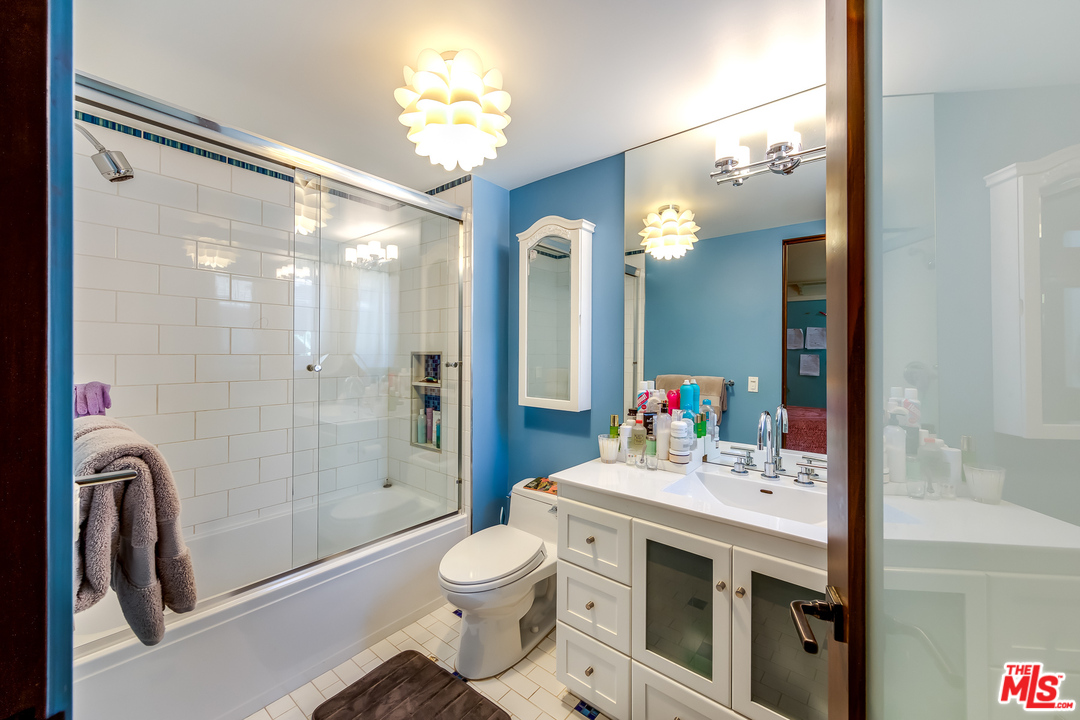 1787 Old Ranch Road Los Angeles, CA 90049 - Photo 41 of 54 a bathroom with a sink a toilet and shower