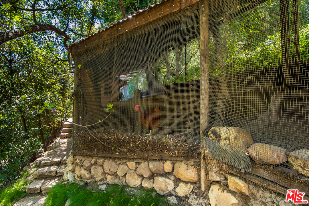1787 Old Ranch Road Los Angeles, CA 90049 - Photo 45 of 54 a bathroom with a toilet