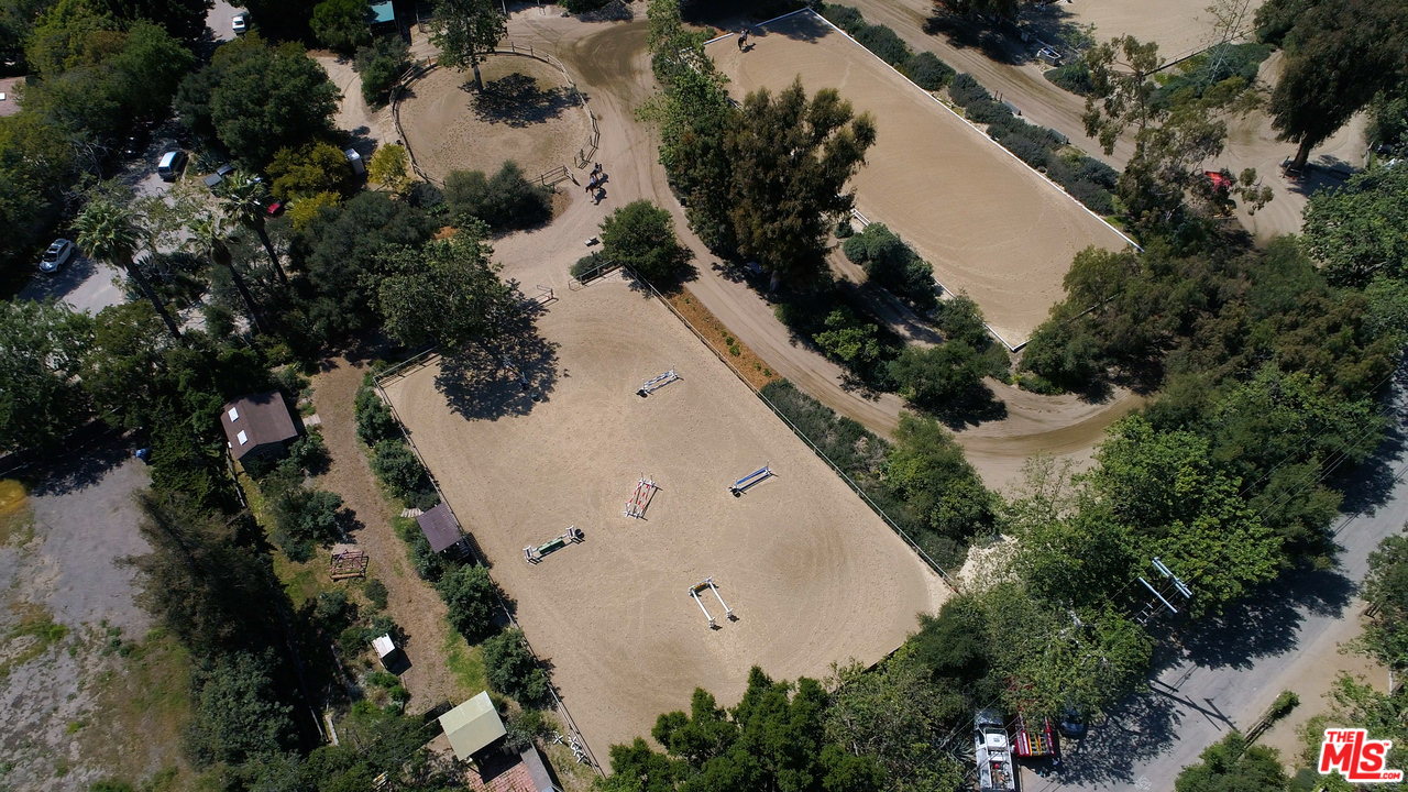 1787 Old Ranch Road Los Angeles, CA 90049 - Photo 47 of 54 an aerial view of residential house with outdoor space and trees all around