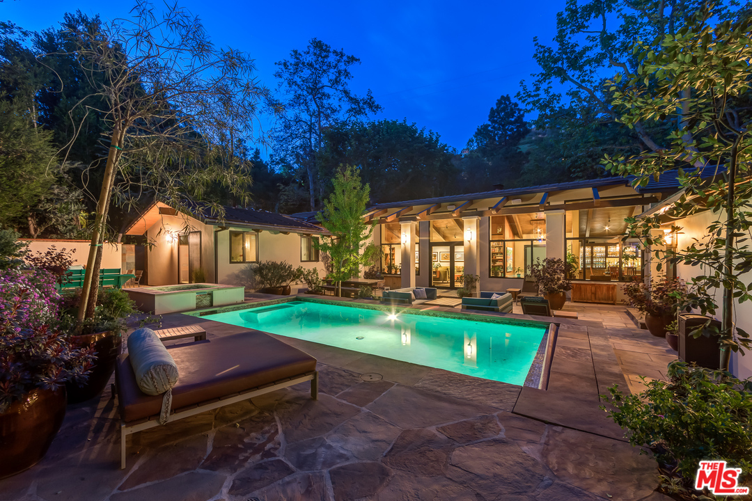 1787 Old Ranch Road Los Angeles, CA 90049 - Photo 53 of 54 a view of a backyard with sitting area
